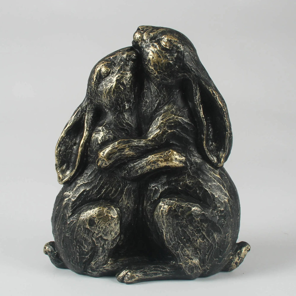 Rabbits Embracing Statue