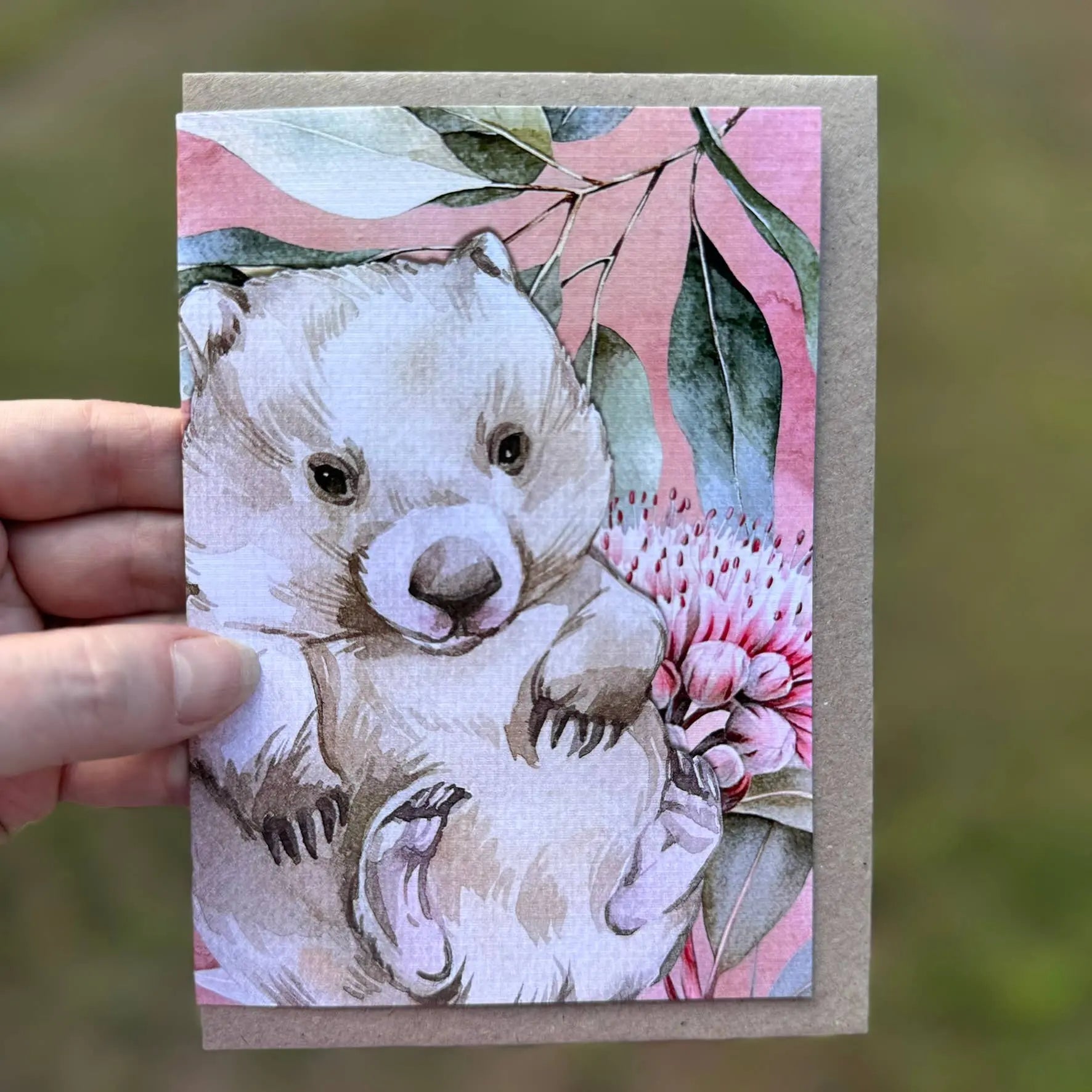 Australian Watercolour Wombat on Australian Flora greeting card Scattered Seed Co